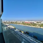 Vista A La Ciudad Sobre El Malecon By G P S Rentas